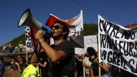 Nationwide Strikes Break Out Opposing Spending Cuts